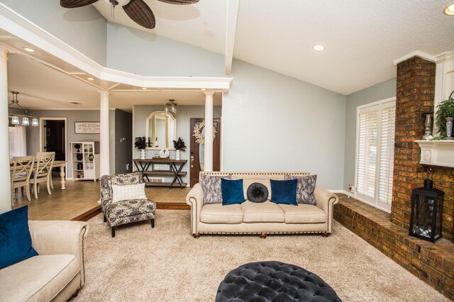 7802 Zoar Ave, Lubbock, TX 79424 - living area with lofted ceiling, a ceiling fan, recessed lighting, and decorative columns