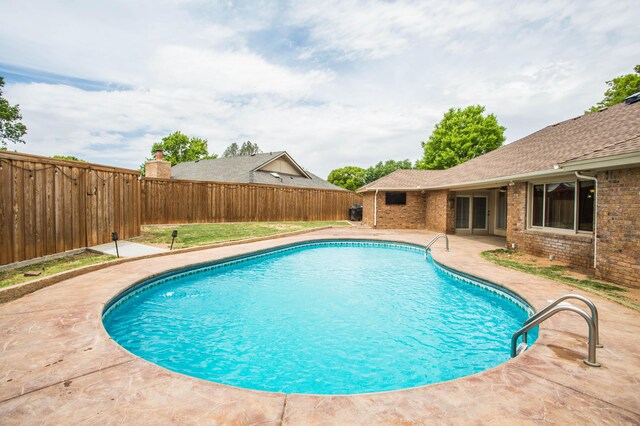 7802 Zoar Ave, Lubbock, TX 79424 - view of pool featuring a fenced backyard and a patio