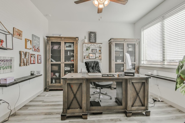 office space with ceiling fan and light wood-type flooring