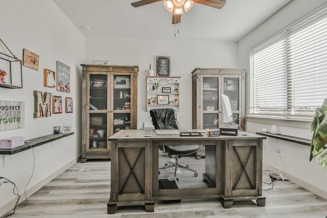 office area with ceiling fan and light wood-type flooring