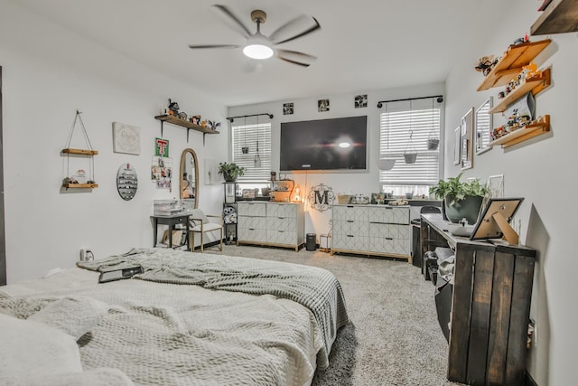 bedroom featuring ceiling fan and carpet flooring