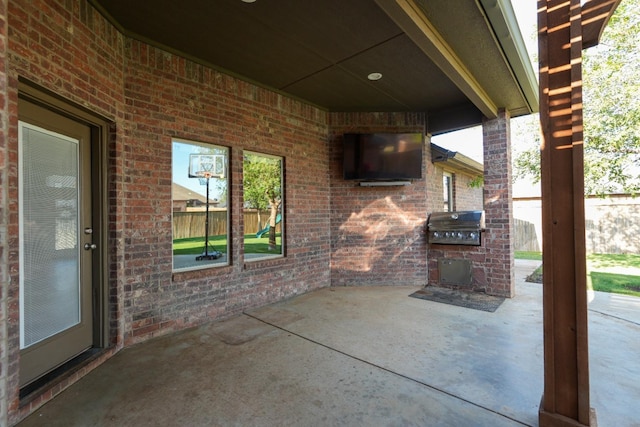 view of patio featuring exterior kitchen