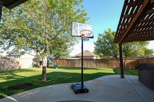 view of patio with a pergola and a playground