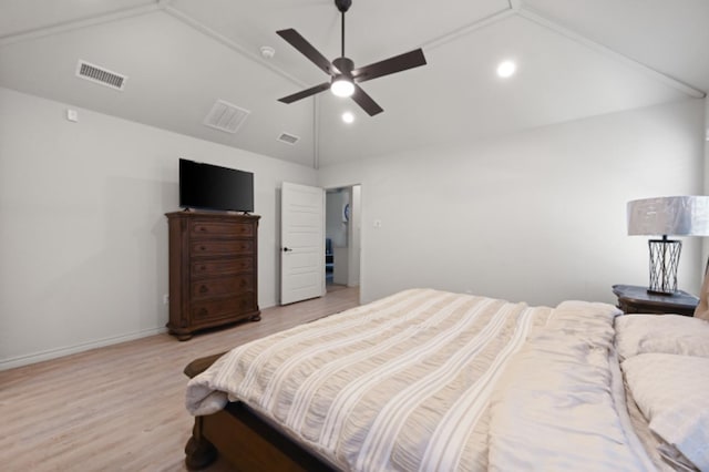 bedroom featuring vaulted ceiling, ceiling fan, and light hardwood / wood-style flooring