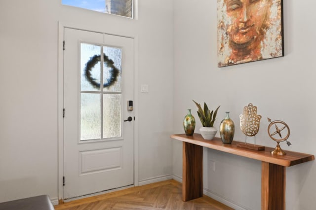 entrance foyer featuring light parquet flooring