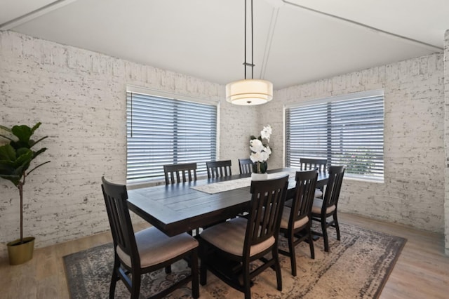 dining room with hardwood / wood-style flooring