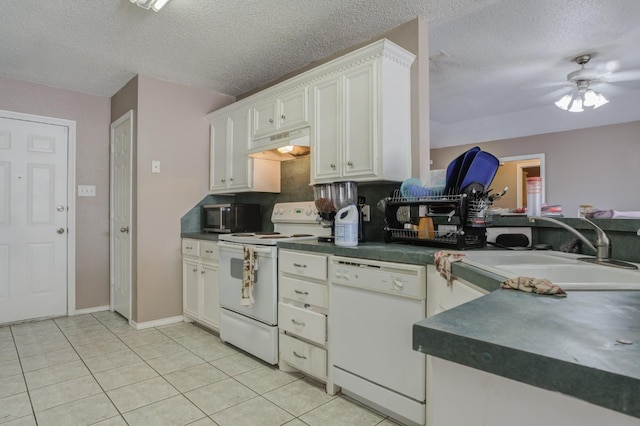 kitchen with sink, white cabinets, light tile patterned floors, ceiling fan, and white appliances