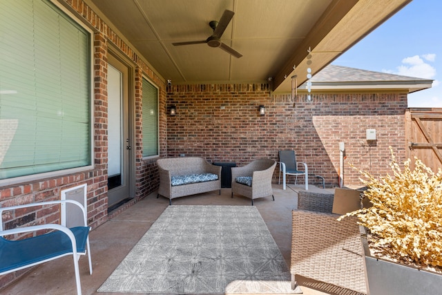 view of patio featuring ceiling fan