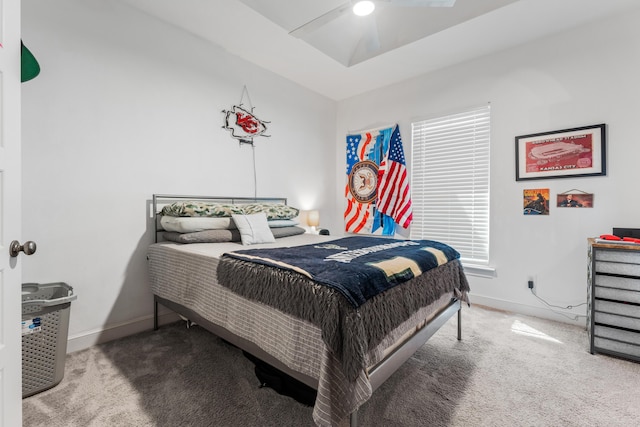 bedroom featuring ceiling fan, baseboards, and carpet flooring