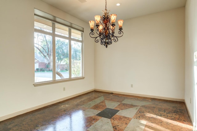 empty room with a chandelier