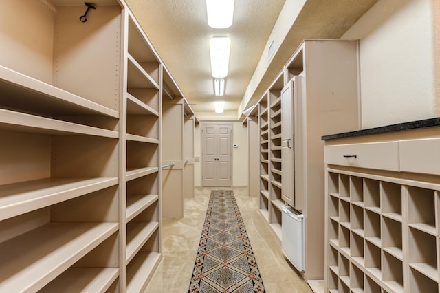 wine area with a textured ceiling