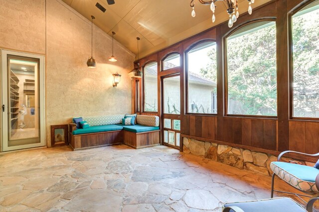 sunroom / solarium with lofted ceiling