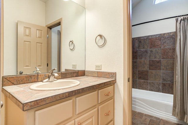 bathroom with shower / tub combo with curtain and vanity