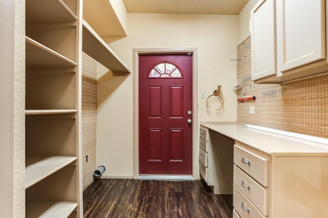 interior space with dark hardwood / wood-style flooring