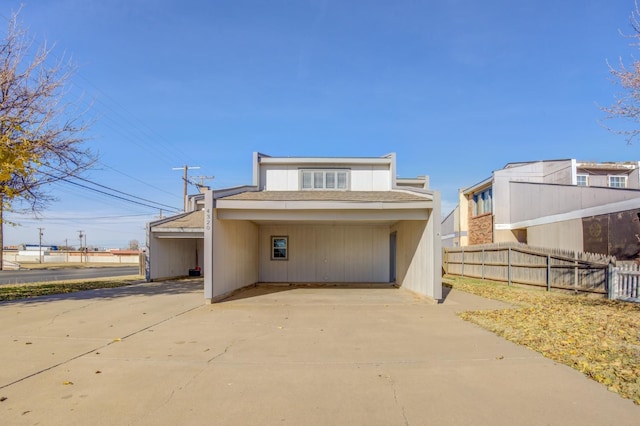 exterior space with a carport