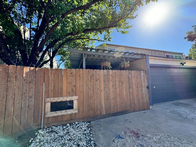 exterior space with a garage