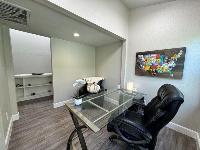 office area with hardwood / wood-style floors