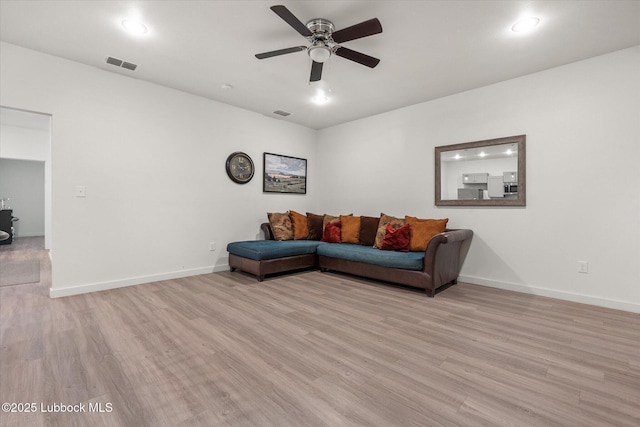 1203 N Evanston Ave, Lubbock, TX 79416 - living area featuring light wood-type flooring, ceiling fan, and recessed lighting