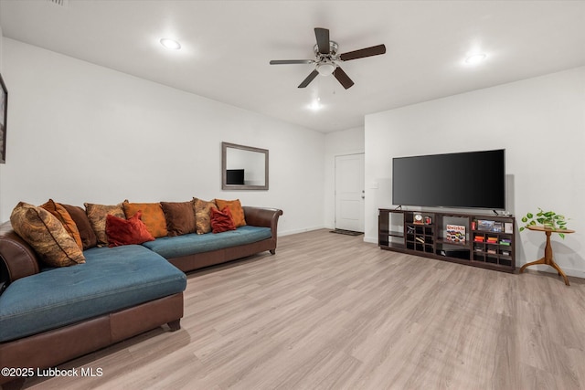1203 N Evanston Ave, Lubbock, TX 79416 - living room featuring light wood-style flooring, ceiling fan, and recessed lighting