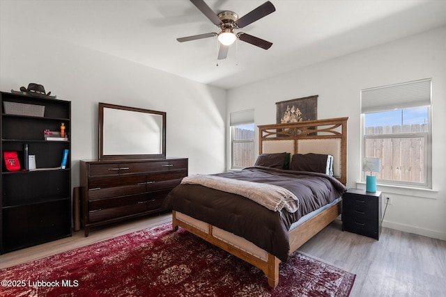 1203 N Evanston Ave, Lubbock, TX 79416 - bedroom with light wood-style floors and ceiling fan