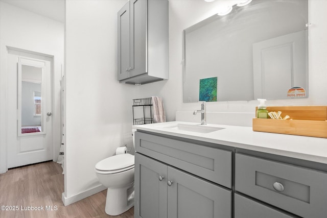 1203 N Evanston Ave, Lubbock, TX 79416 - bathroom with vanity and wood finished floors