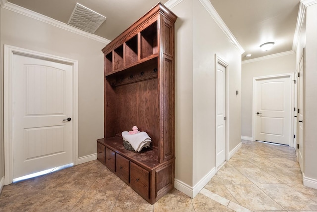 mudroom with baseboards, visible vents, and ornamental molding