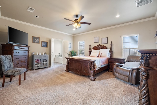 carpeted bedroom with visible vents, connected bathroom, and crown molding