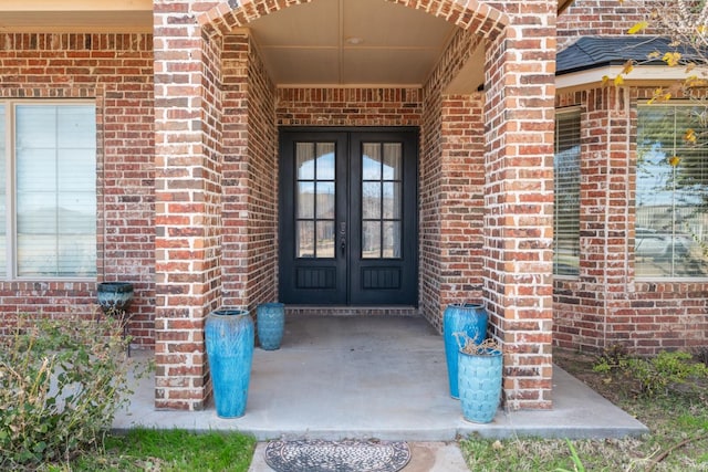 doorway to property featuring french doors