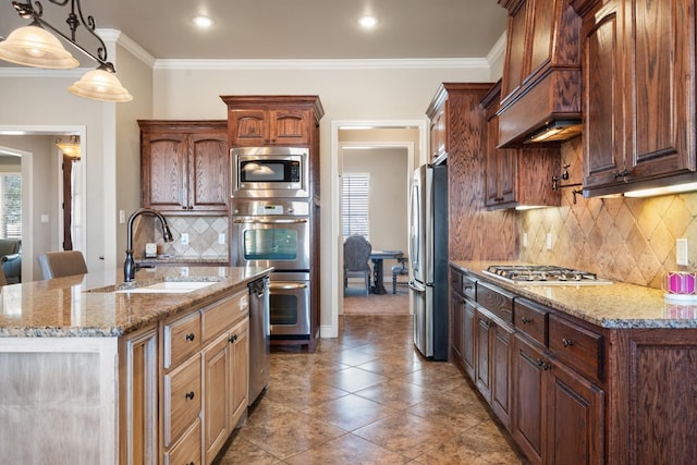 kitchen featuring a sink, stainless steel appliances, light tile patterned flooring, crown molding, and light stone countertops