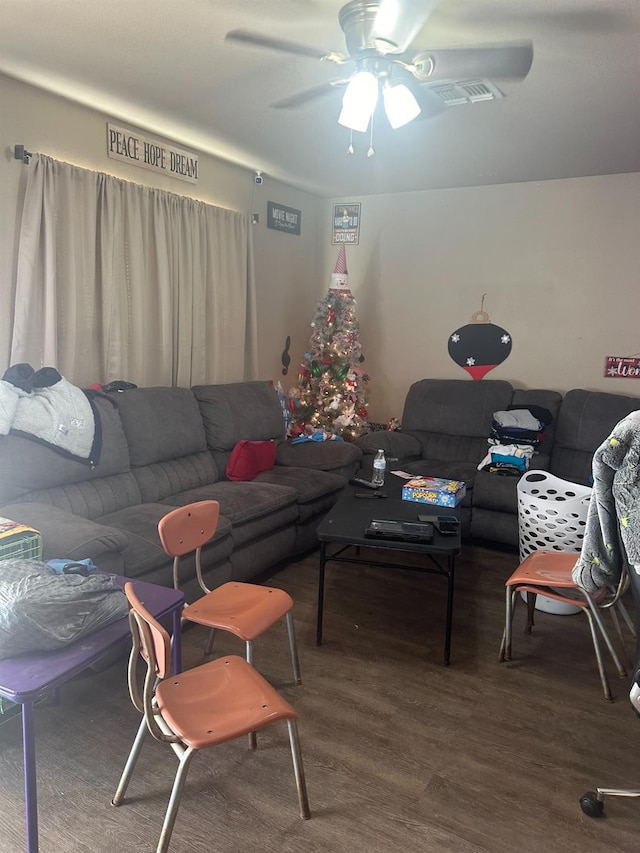 living room with ceiling fan and wood-type flooring