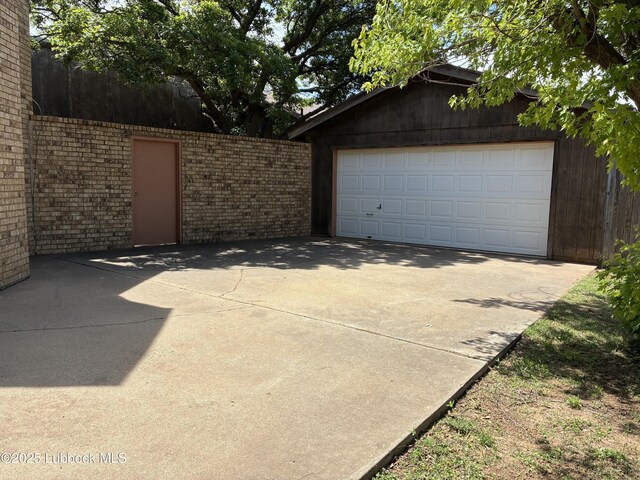 1423 Cherry Blossom Dr, Littlefield, TX 79339 - view of garage