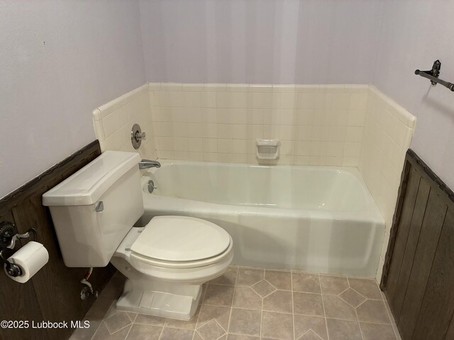 1423 Cherry Blossom Dr, Littlefield, TX 79339 - bathroom with a bath and tile patterned floors