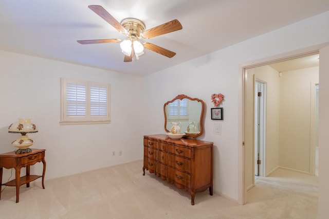 hall with light colored carpet