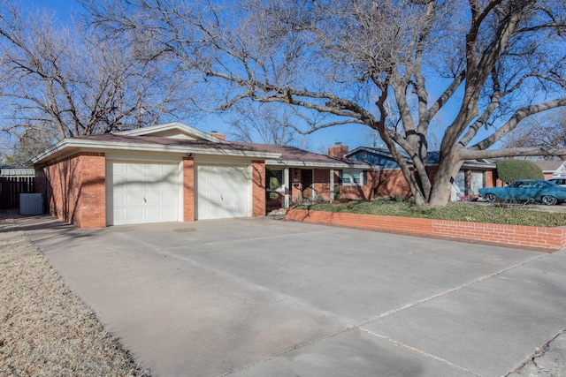 ranch-style house featuring a garage