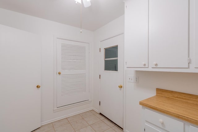 doorway featuring light tile patterned floors