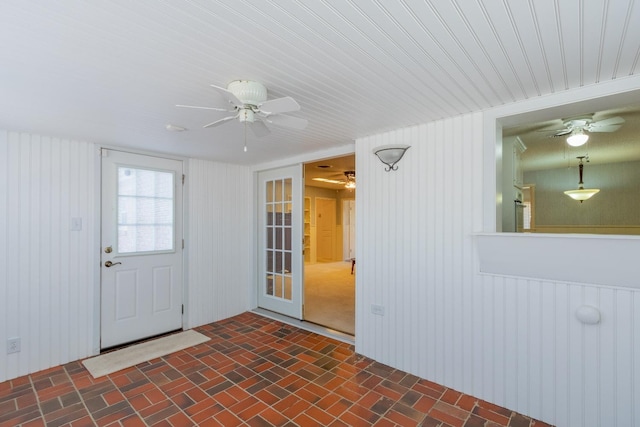 interior space featuring french doors and ceiling fan