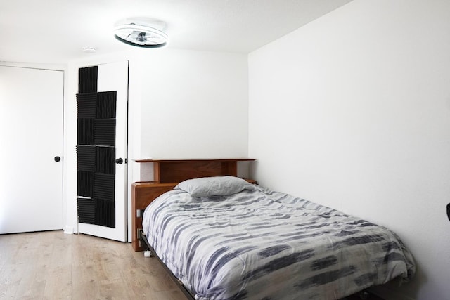 bedroom with light hardwood / wood-style floors