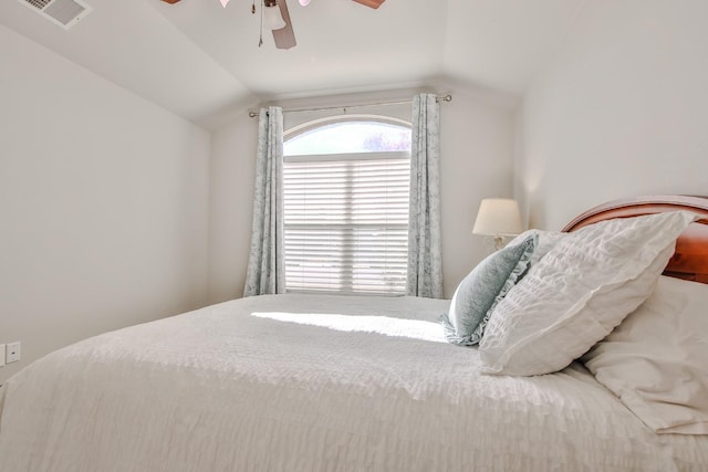 bedroom featuring vaulted ceiling and ceiling fan