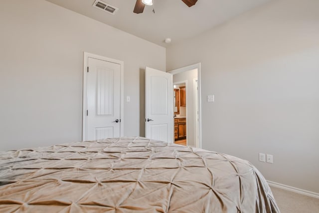 unfurnished bedroom featuring ceiling fan and carpet floors