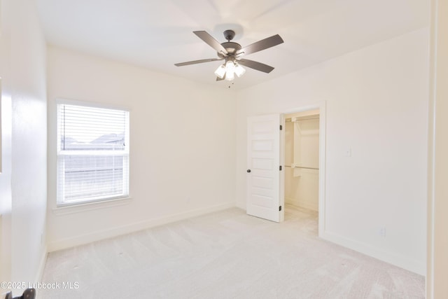 5005 Prentiss Ave, Lubbock, TX 79407 - empty room featuring light carpet and ceiling fan