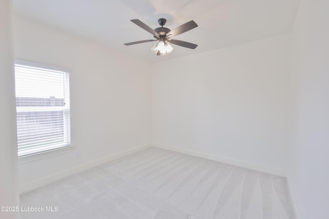 5005 Prentiss Ave, Lubbock, TX 79407 - spare room featuring light carpet and a ceiling fan