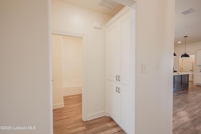 5005 Prentiss Ave, Lubbock, TX 79407 - hall featuring light wood-type flooring