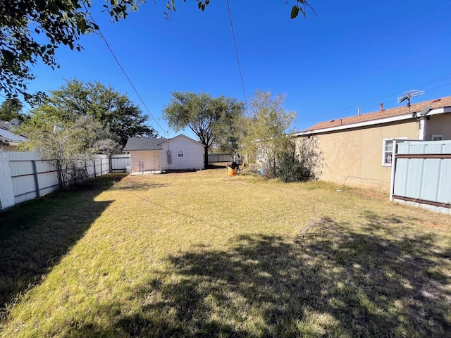 view of yard with a storage shed