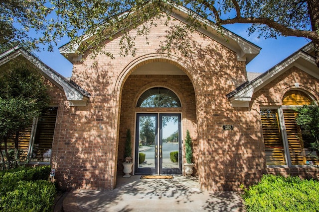 doorway to property featuring french doors