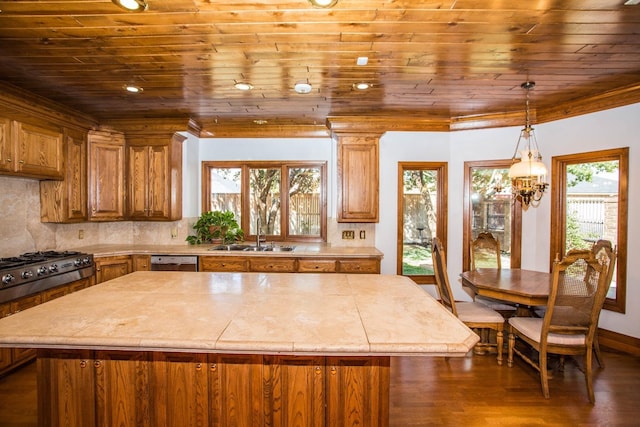 kitchen with sink, dishwasher, backsplash, a wealth of natural light, and wooden ceiling