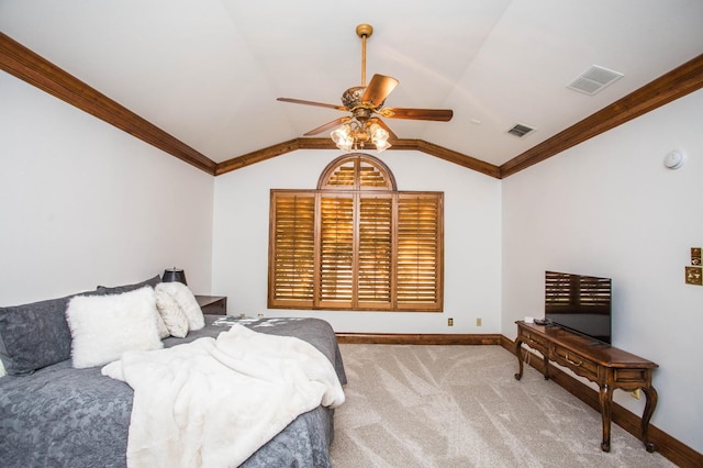 carpeted bedroom with crown molding, ceiling fan, and lofted ceiling