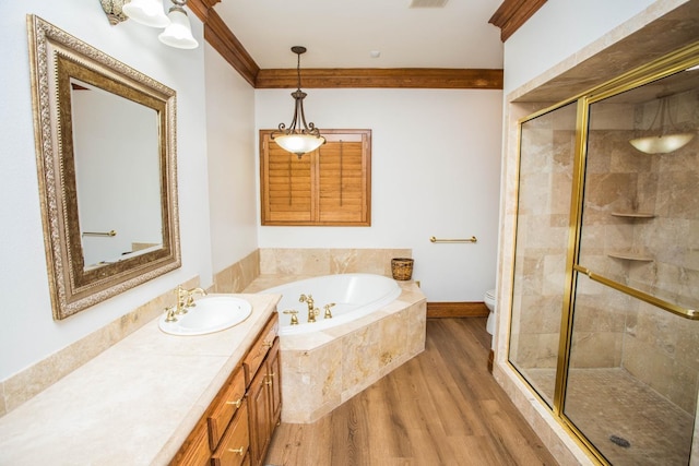 full bathroom with crown molding, independent shower and bath, toilet, and hardwood / wood-style flooring