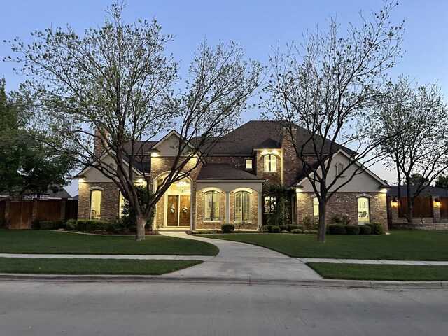 4009 109th St, Lubbock, TX 79423 - french country style house with brick siding