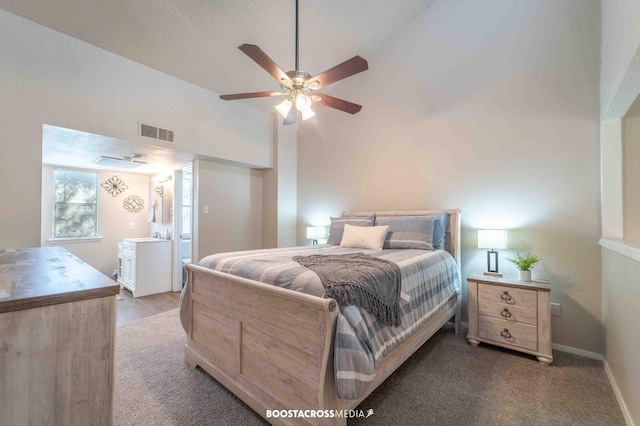 bedroom featuring lofted ceiling and ceiling fan