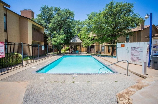 view of pool with a gazebo and a patio area